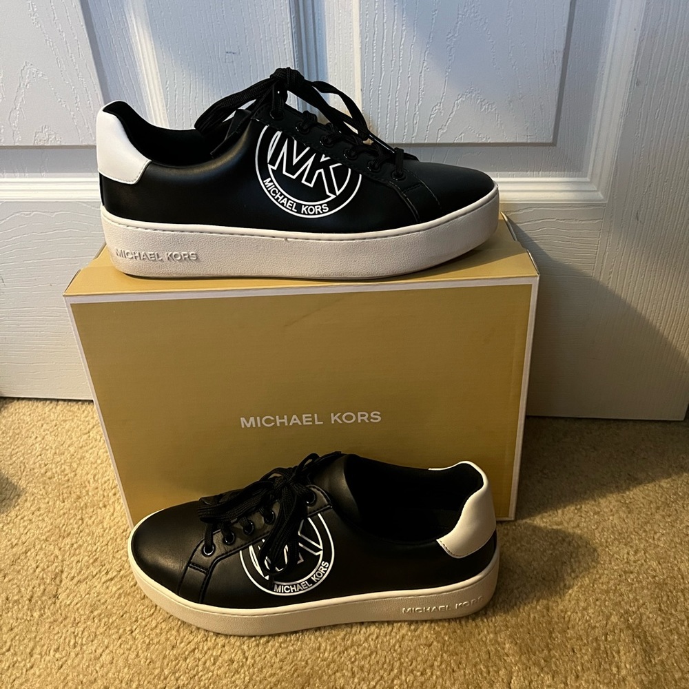 Wore once and gently used women’s sneakers.